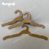 Cardboard hangers made from FSC renewable kraft paperboard, recyclable and fully biodegradable, suitable for display of children's size clothing tops