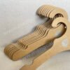 Kraft children's clothing cardboard hangers commissioned by the littlest brand, renewable and biodegradable, suitable for displaying children's and baby clothing sizes