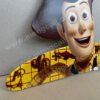 A cardboard clothes hanger made from recycled cardboard material and customized with the character Woody from Toy Story. The product is recyclable, degradable, and has a unique personalized clothing display effect.